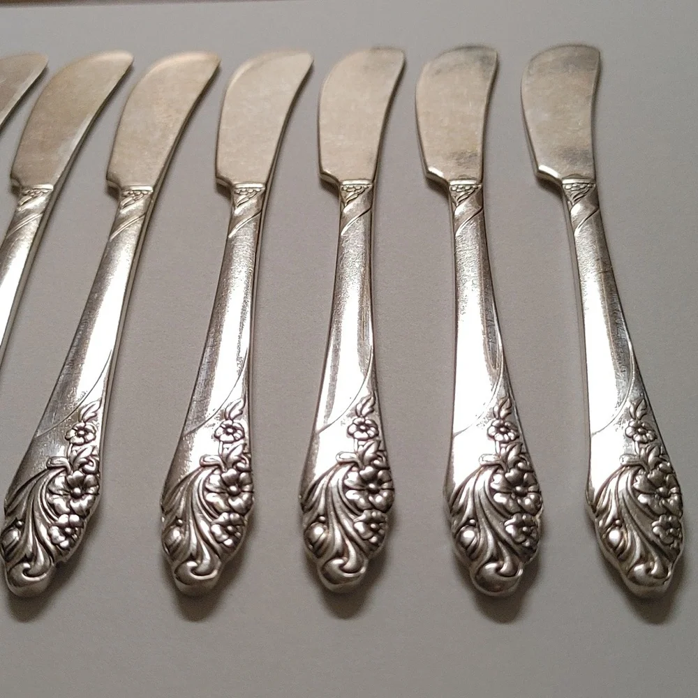 Oneida Evening Star Silver Plate Butter Knives Lot of 9
